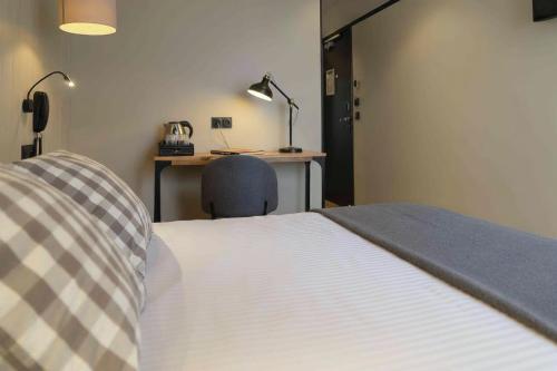 Hotel SUBにあるベッド