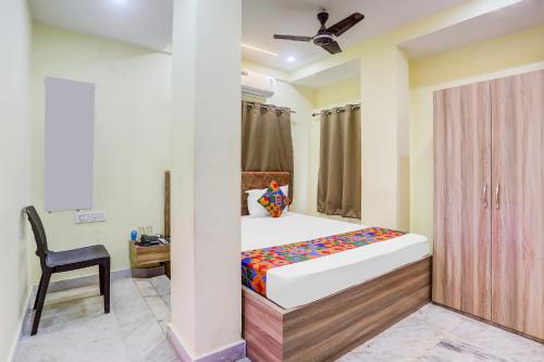 Katil atau katil-katil dalam bilik di FabHotel Royal Rose Residency