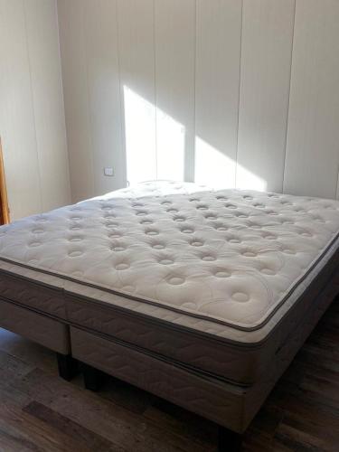 Ein Bett oder Betten in einem Zimmer der Unterkunft Refugio El Toro