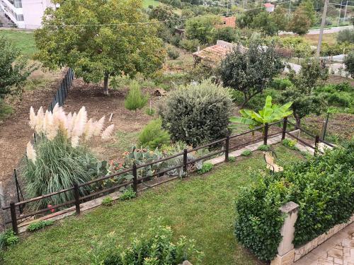 an aerial view of a garden with a wooden fence at La dimora dei Sanniti in Busso