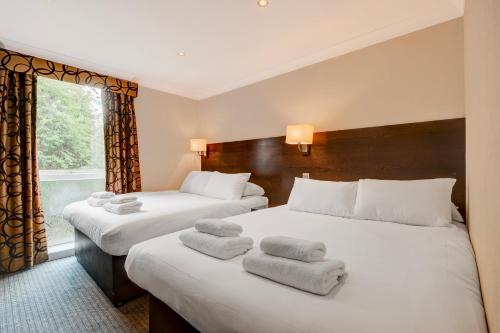 Katil atau katil-katil dalam bilik di Liverpool Aigburth Hotel By Belvilla