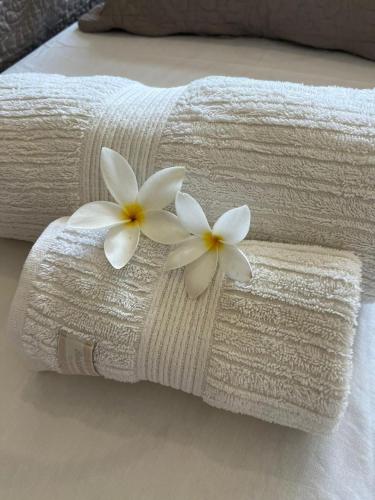 Katil atau katil-katil dalam bilik di Suites Amma Noronha