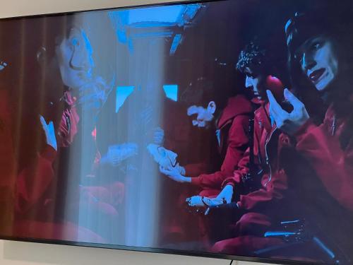 a television screen with people playing a video game at The Bay in Dehiwala