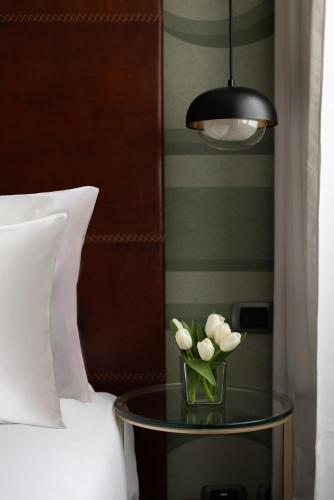 Cama o camas de una habitación en Maison Roma Piazza di Spagna UNA Esperienze