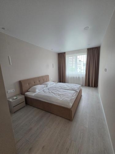 Postel nebo postele na pokoji v ubytování Truskavets Platinum Apartment 49,50