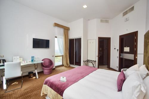Cama o camas de una habitación en Hotel Panorama De Luxe