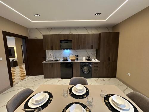 Køkken eller tekøkken på Venicia Hotel فندق فينيسيا