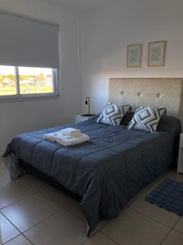 Ένα ή περισσότερα κρεβάτια σε δωμάτιο στο Como en casa
