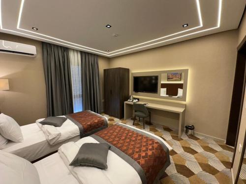 Ένα ή περισσότερα κρεβάτια σε δωμάτιο στο Venicia Hotel فندق فينيسيا