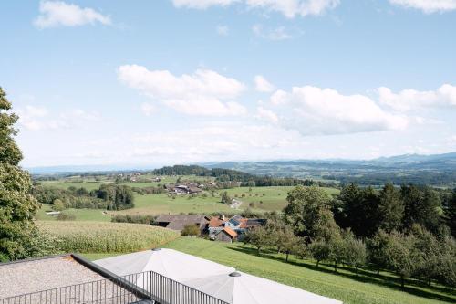 a view of a farm from the roof of a house at Hotel & Restaurant Nollen in Hosenruck