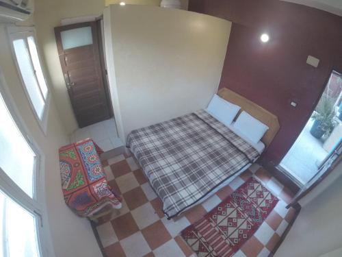 an overhead view of a room with a bed at Dahab Hostel in Cairo