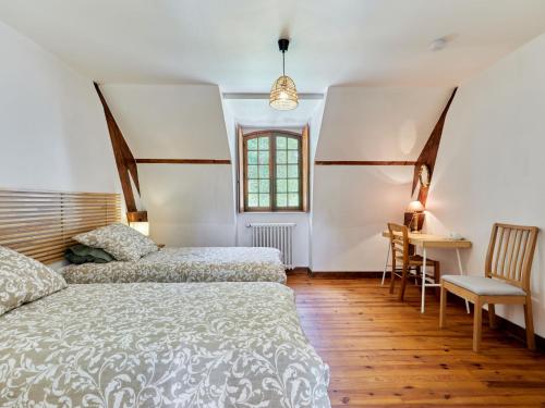 Katil atau katil-katil dalam bilik di Holiday Home Le Pressoir de la laize by Interhome