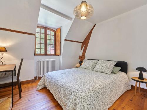 Katil atau katil-katil dalam bilik di Holiday Home Le Pressoir de la laize by Interhome