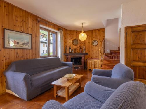 a living room with a couch and a table at Apartment Oga Mountain Home by Interhome in Oga