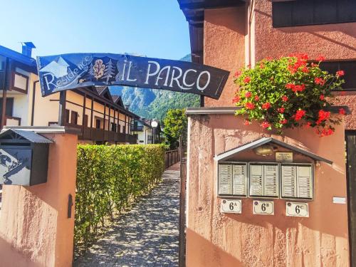 a street sign on the side of a building at Apartment Al Parco by Interhome in Carisolo
