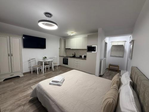 En eller flere senge i et værelse på The View Studio Busteni