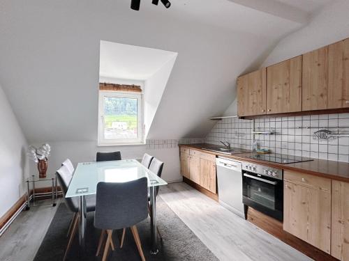Kuchyň nebo kuchyňský kout v ubytování Up Residences S
