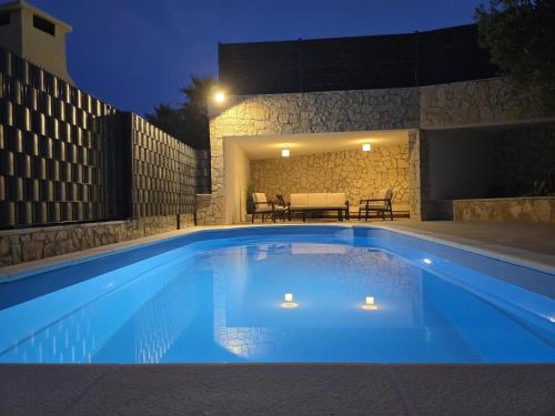 Πισίνα στο ή κοντά στο Holiday Home Jakasa
