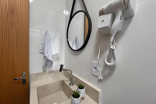 Koupelna v ubytování Moderno Loft com ar condicionado e vaga