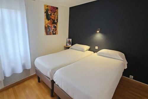 Katil atau katil-katil dalam bilik di Brit Hotel Limoges Nord - Ex Fasthôtel