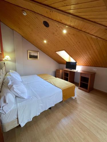 Postel nebo postele na pokoji v ubytování Gran Hotel Spa Parque de Cazorla