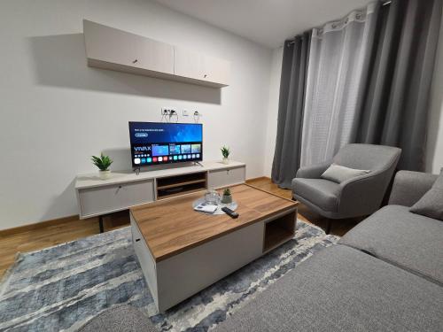 TV a/nebo společenská místnost v ubytování Green Garden Complex