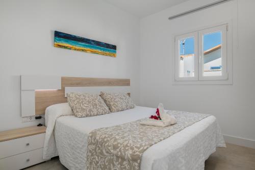 Postel nebo postele na pokoji v ubytování Casa Verde agua