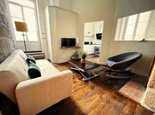 TV a/nebo společenská místnost v ubytování Villa Chadourne - Le Vasco