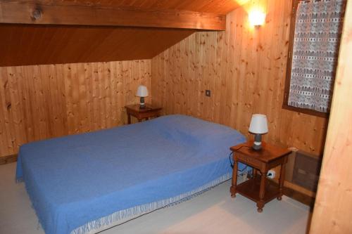 Postel nebo postele na pokoji v ubytování Chalet Demima