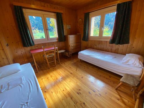 Lova arba lovos apgyvendinimo įstaigoje Chalet Le Lezard
