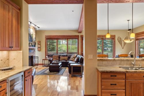 a kitchen and living room with a couch at Tramontana 1 - Tramontana Trailhead in Telluride