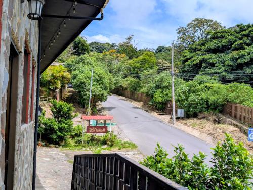 a view of a road from a building at Miztli Lodge & Adventure in Monteverde Costa Rica