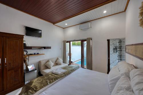 Ένα ή περισσότερα κρεβάτια σε δωμάτιο στο Rostin Mesari Villa