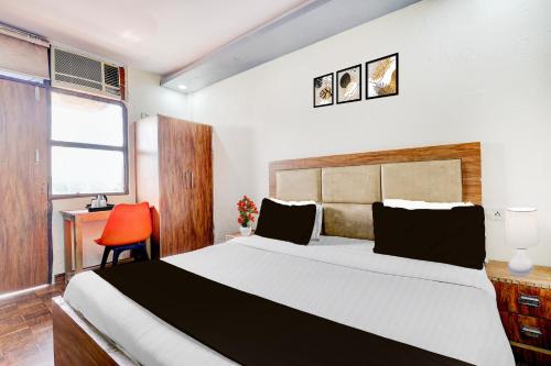 Katil atau katil-katil dalam bilik di Hotel O DIAMOND INN