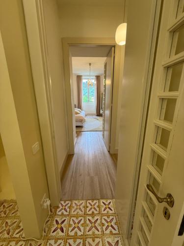 a hallway with a door leading to a living room at Casa Del Re in Tufo