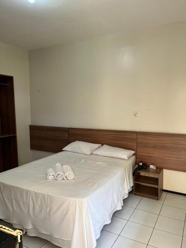 Una cama o camas en una habitación de Pousada Lagoa Seca