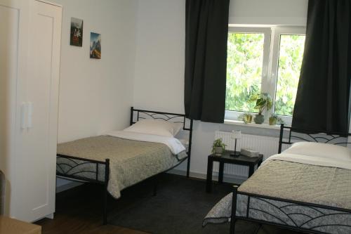Ένα ή περισσότερα κρεβάτια σε δωμάτιο στο Seehafen Hostel Bergedorf
