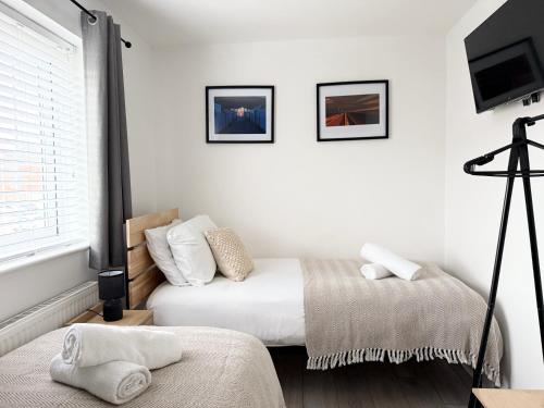 Кровать или кровати в номере 2 Bed Home Port Talbot - Perfect For Contractors & Long Stays
