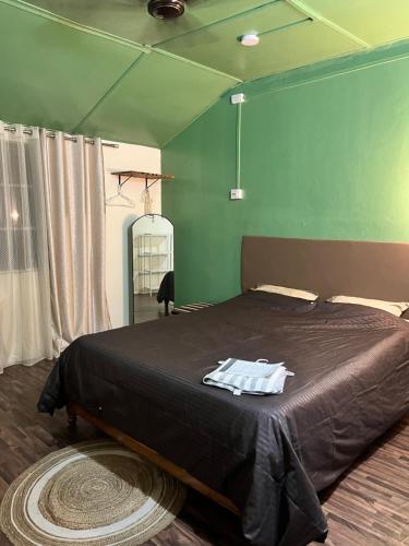 Ένα ή περισσότερα κρεβάτια σε δωμάτιο στο Prime Cottage 2bhk independent cottage home