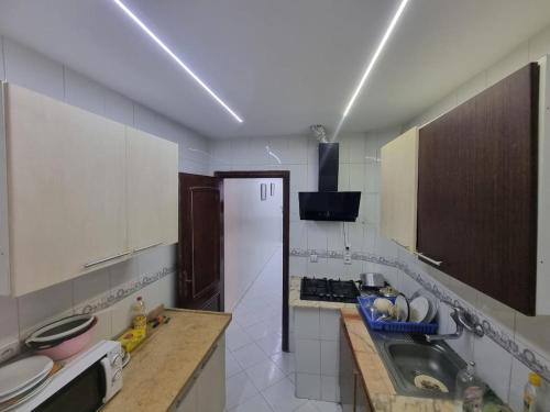 Η κουζίνα ή μικρή κουζίνα στο Votre Appartement de Vacances en Plein Cœur Tanger