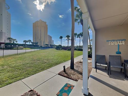 a view of a park with a bench and a field at Grand Caribbean Perdido Key #101 West in Perdido Key