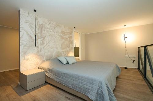 Postel nebo postele na pokoji v ubytování Navigli-Duomo, Luxury Modern Loft