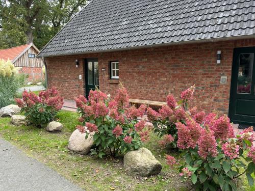 Un jardín fuera de Eiche - Ferienwohnung in Dötlingen mit Waldblick