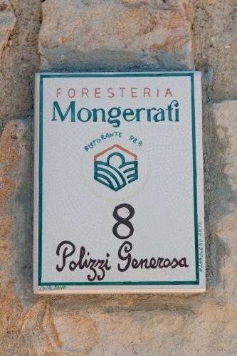 Un certificado, premio, letrero u otro documento en Foresteria Mongerrati