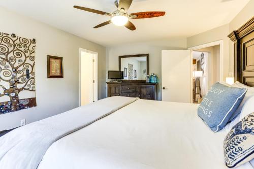 a bedroom with a bed and a ceiling fan at Gorgeous San Marco Home with Patio and Grill! in San Marcos