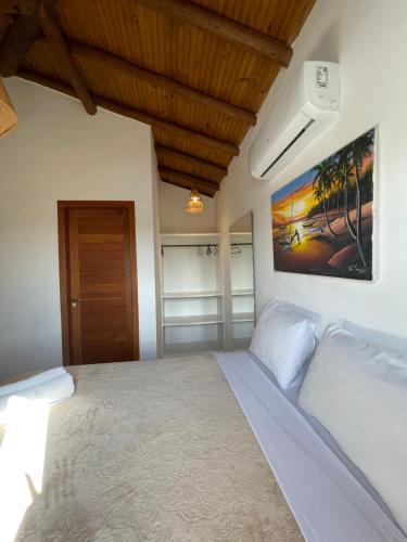 En eller flere senge i et værelse på Casa nobre Trancoso