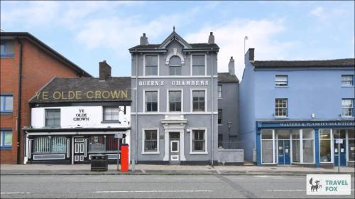 a building on the corner of a street at 2 Bedroom Central Stay in Stoke on Trent