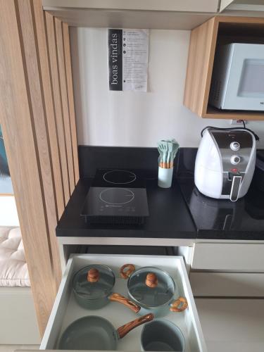 Η κουζίνα ή μικρή κουζίνα στο Apartamento, Studio, Loft - GO Rio Branco, próximo HCPA e HPS