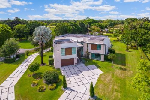 an aerial view of a house with a yard at Modani Estates in Miami