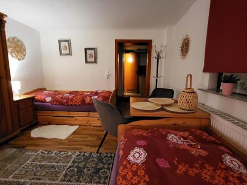 Katil atau katil-katil dalam bilik di Jolanta-Ferienwohnung an der A3